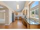 Kitchen featuring granite countertops, stainless steel appliances, and a built-in workstation at 8985 Edgewood Ln, Highlands Ranch, CO 80130