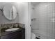 Updated bathroom with mosaic tile accents and a walk-in shower at 2193 Arapahoe St # 15, Denver, CO 80205