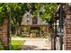 Landscaped courtyard featuring a table and chairs set on a concrete path at 2193 Arapahoe St # 15, Denver, CO 80205