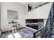 Open layout with staircase leading to kitchen featuring stainless appliances and modern finishes at 2193 Arapahoe St # 15, Denver, CO 80205