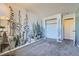 Comfortable bedroom boasting a spacious closet and unique woodland-themed wall design at 11922 Bellaire St # F, Thornton, CO 80233