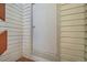 White door on the exterior of a home surrounded by white vinyl siding at 11922 Bellaire St # F, Thornton, CO 80233