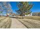 Well-maintained grounds surrounding the residential buildings, with walkways at 11922 Bellaire St # F, Thornton, CO 80233