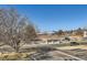 Community parking lot with convenient access to nearby amenities at 11922 Bellaire St # F, Thornton, CO 80233