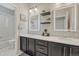 Bright bathroom with dual sinks, modern vanity, and updated fixtures at 26566 E Peakview Dr, Aurora, CO 80016