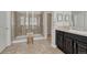 Bathroom featuring a glass enclosed shower, vanity, and modern fixtures at 26566 E Peakview Dr, Aurora, CO 80016