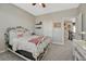 Comfortable secondary bedroom with neutral colors and walk in closet at 26566 E Peakview Dr, Aurora, CO 80016