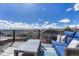 Relax on your deck with neighborhood views on a sunny day at 26566 E Peakview Dr, Aurora, CO 80016