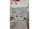 Bright living room with plantation shutters, plush seating, and modern decor at 26566 E Peakview Dr, Aurora, CO 80016