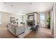 Comfortable living room with cozy seating, a fireplace, and plenty of natural light at 4913 Cathay Ct, Denver, CO 80249