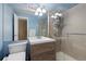 Bathroom featuring modern vanity, fixtures, and glass-enclosed shower at 1150 Vine St # 306, Denver, CO 80206
