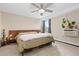 Relaxing bedroom with ceiling fan, natural light, and room to unwind at 1150 Vine St # 306, Denver, CO 80206