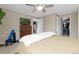 Bedroom featuring ceiling fan, closet, TV and comfortable space to rest and recharge at 1150 Vine St # 306, Denver, CO 80206