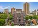 Apartment building with multiple balconies offers city views and convenient parking at 1150 Vine St # 306, Denver, CO 80206