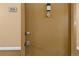 Apartment 306 exterior front door view shows a secure lock, peephole, and Ring doorbell camera system for added safety at 1150 Vine St # 306, Denver, CO 80206