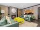 Cozy living room featuring a fireplace and a pass-through window to the kitchen allowing light to flow through at 1150 Vine St # 306, Denver, CO 80206