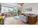 Stylish living room featuring a comfortable gray couch and a charming outdoor balcony area at 1150 Vine St # 306, Denver, CO 80206