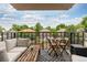 Cozy patio perfect for outdoor lounging and dining with neighborhood views at 1150 Vine St # 306, Denver, CO 80206
