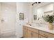 Well-lit bathroom with modern fixtures, stylish vanity, and a shower-tub combination at 3130 Wyandot St, Denver, CO 80211