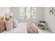 Bright bedroom featuring a large window with pleasant natural light at 3130 Wyandot St, Denver, CO 80211