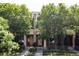 Attractive modern exterior with well-manicured landscaping and mature trees at 3130 Wyandot St, Denver, CO 80211