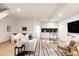 Spacious living room with modern furniture and a stylish rug at 3130 Wyandot St, Denver, CO 80211
