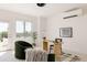 Bright home office with a modern desk, comfortable seating, and large window views at 3130 Wyandot St, Denver, CO 80211