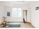 Bright yoga studio space with wood floors, mirror, and abundant natural light at 3130 Wyandot St, Denver, CO 80211