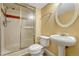 Clean bathroom showcasing a glass-enclosed shower and a classic pedestal sink, offering a practical and timeless space at 7729 S Cove Cir, Centennial, CO 80122