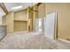 Spacious carpeted bedroom features neutral paint, high ceilings, and closet storage at 7729 S Cove Cir, Centennial, CO 80122