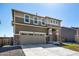 Lovely two-story home with a two-car garage and ample driveway space at 9334 Sedalia St, Commerce City, CO 80022