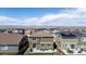 Two-story home with a patio, furniture, grill and mountain views at 9334 Sedalia St, Commerce City, CO 80022