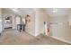 Upstairs hallway with desk and shelving plus stairway leading up and stairway leading down at 2047 S Franklin St, Denver, CO 80210