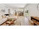 Spacious living area featuring stairs, and a sliding glass door to the backyard at 2931 S Sidney Ct, Denver, CO 80231