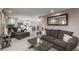 Spacious living room with modern furnishings and an open floor plan at 8151 S Marshall Ct, Littleton, CO 80128