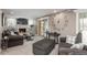 Spacious living room with fireplace, and modern furnishings at 8151 S Marshall Ct, Littleton, CO 80128