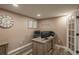 Well-lit office space with wood floors, a large desk, and neutral-colored walls at 8151 S Marshall Ct, Littleton, CO 80128