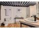 Bathroom featuring double sinks, with modern fixtures, and neutral tones at 1000 E 18Th Ave # 107, Denver, CO 80218