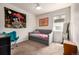 Charming bedroom features bright decor, carpet floors, and a soft daybed at 42425 Forest Oaks Dr, Elizabeth, CO 80107