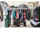 Walk-in closet with organized clothing racks, shelves, and shoe storage, maximizing storage space at 42425 Forest Oaks Dr, Elizabeth, CO 80107