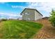 Exterior view of home featuring a well-kept lawn and stylish design at 42425 Forest Oaks Dr, Elizabeth, CO 80107