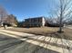 Inviting exterior of a two-story home with mature trees and a spacious front yard at 1592 S Memphis St, Aurora, CO 80017