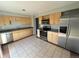 Functional kitchen featuring stainless steel appliances and ample counter space at 1592 S Memphis St, Aurora, CO 80017