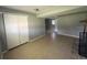 This living room has tile floors and a brick fireplace with a dark wood mantel and hearth at 1592 S Memphis St, Aurora, CO 80017