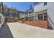 Spacious backyard with brick accents, a concrete ground, and a seating area at 2120 W 31St Ave, Denver, CO 80211