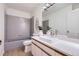 Well-lit bathroom features modern vanity with rectangular sink and stylish tile at 2120 W 31St Ave, Denver, CO 80211