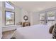 Bright bedroom features natural light, a nook, and refined decor at 2120 W 31St Ave, Denver, CO 80211