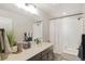 Stylish bathroom with modern vanity, neutral color palette, and a shower-tub combination at 8811 Meade St, Westminster, CO 80031