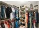 Walk-in closet with ample storage solutions, including rods, shelves, and multiple levels at 8811 Meade St, Westminster, CO 80031