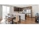 Modern kitchen featuring stainless steel appliances, white countertops, and ample cabinet space at 8811 Meade St, Westminster, CO 80031